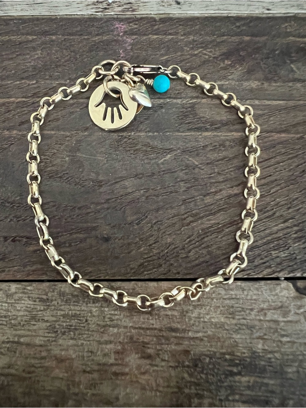 Gold Toned Chain Bracelet with Hamsa, and Heart Charms and Turquoise Bead